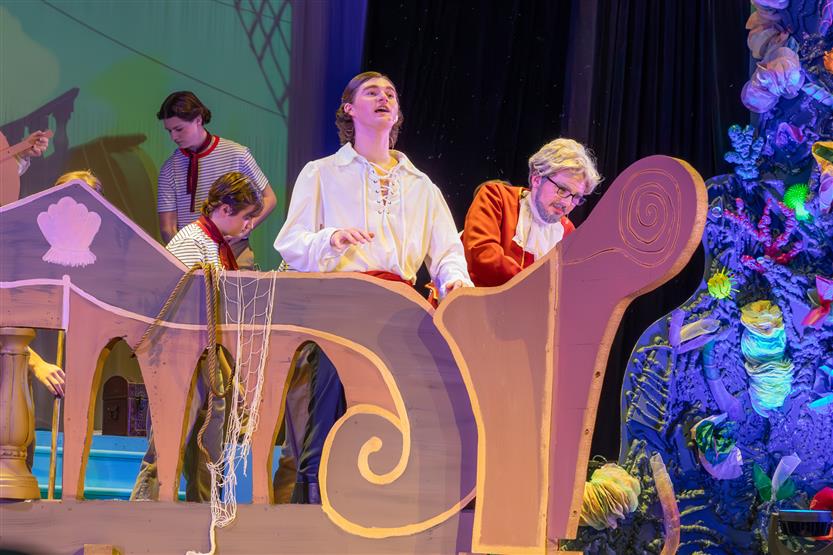 Students perform onstage